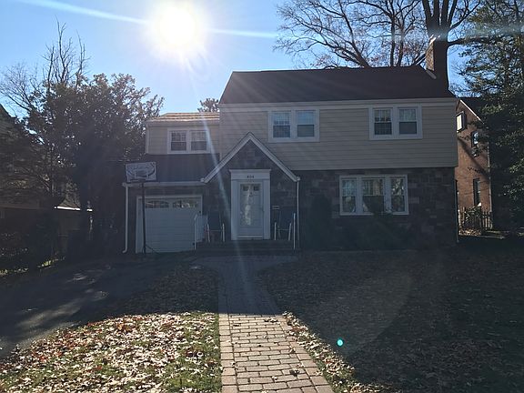 New siding, roof, grass