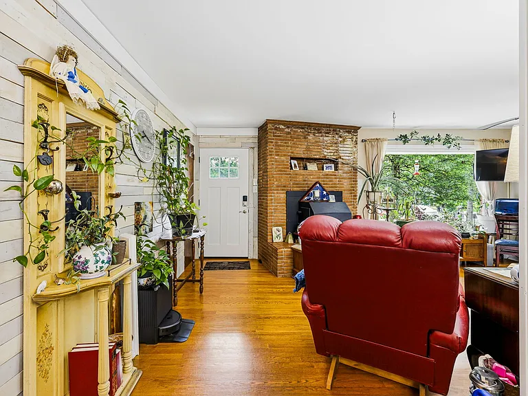 MAIN LEVEL: Front Door and Living Room (on right), (Dining Room behind camera, Hall to left of camera)