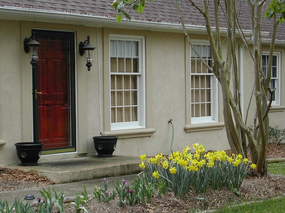 Cream stucco with red door!