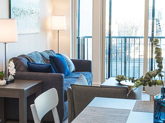 4 - Living Room & Balcony - Nine+Eighteen
