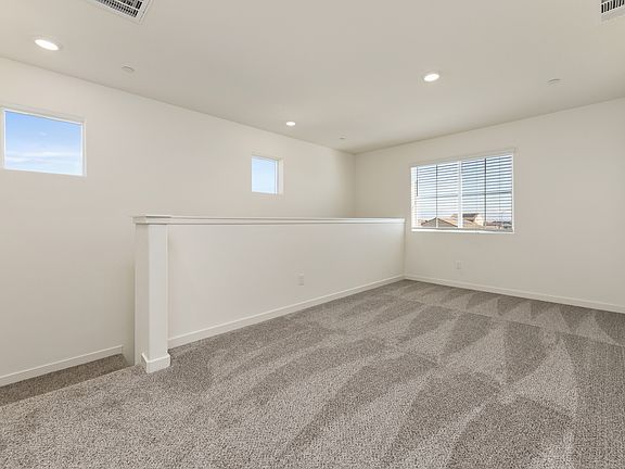 The game room is upstairs and has carpet.