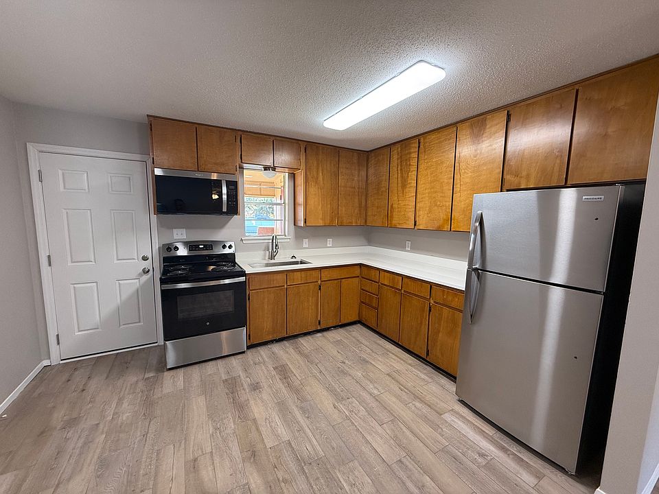 New Quartz Counter Top with deep single bowl sink; new appliances