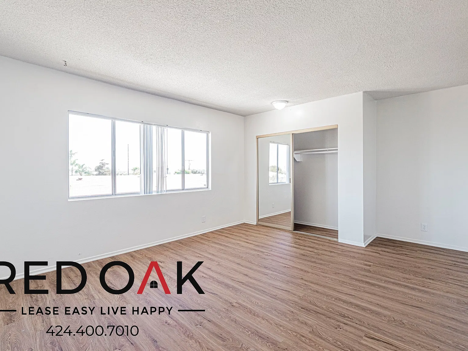 Refined 1-Bed with Air Conditioning, Gated Entry, On-Site Laundry and Parking Available in the He... — Photo 3