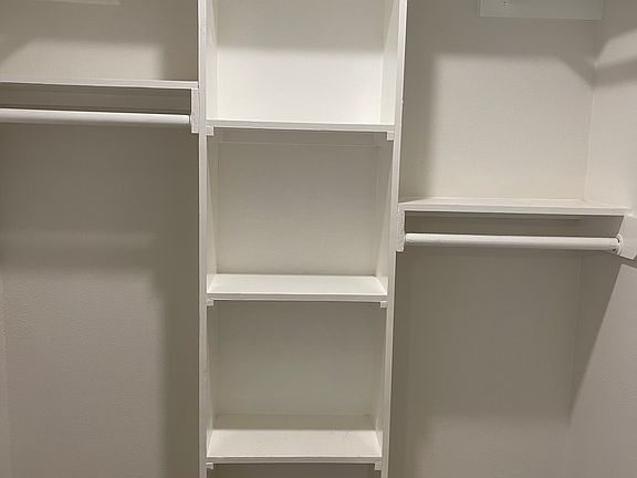 Bedroom 1's walk in closet.