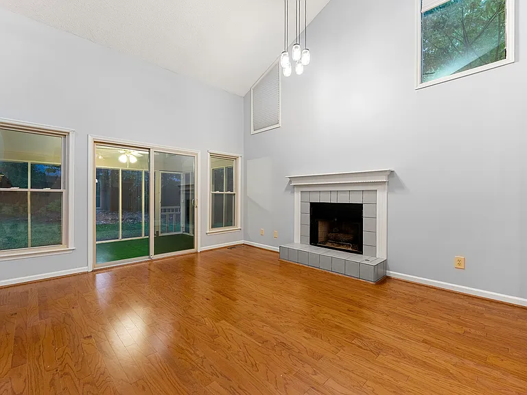 Living room downstairs, exit to backyard