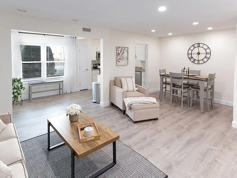 LIVING/DINING AREA IN COOLIDGE FLOORPLAN - ONE BEDROOM - MODEL APARTMENT