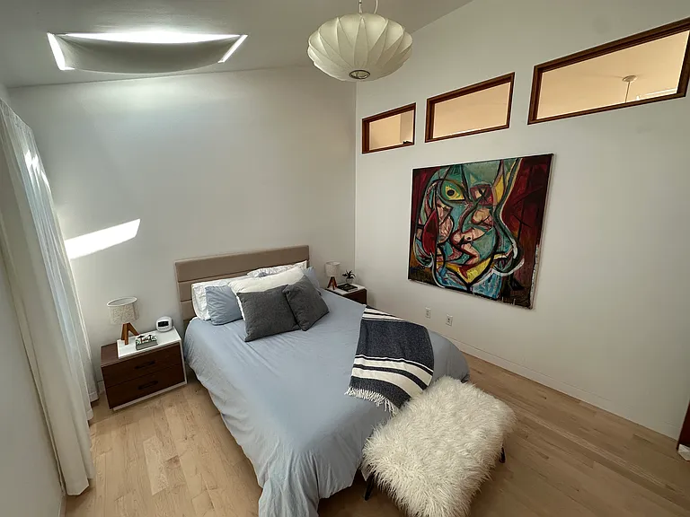 Large guest bedroom, queen size bed (new), skylights, built in closet