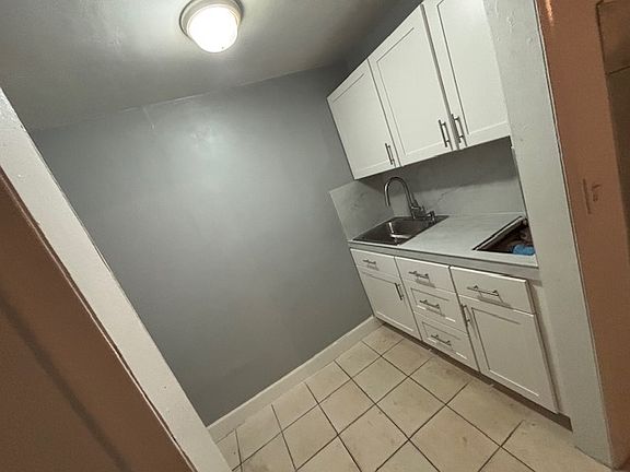 Newly renovated kitchenette, lower storage drawers, and a wide countertop for easy meal prep. Large GE refrigerator Plenty of storage space and room for electric appliances