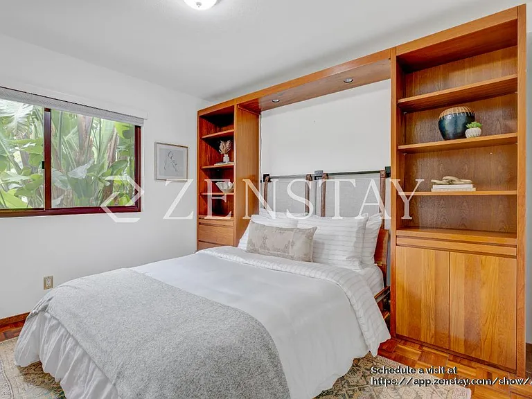 Comfortable bedroom with queen bed and inviting layout