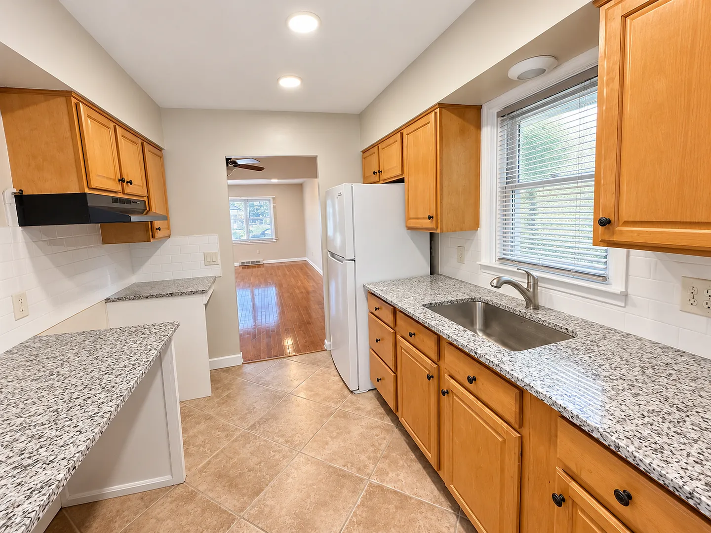 Charming 3BR Home with Full Basement, Hardwood Floors & Carport — Photo 4