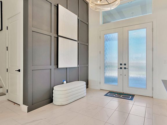 The Entry Way of a DRB Homes Grand Eider model, which is a home plan offered at Serengeti in Spring