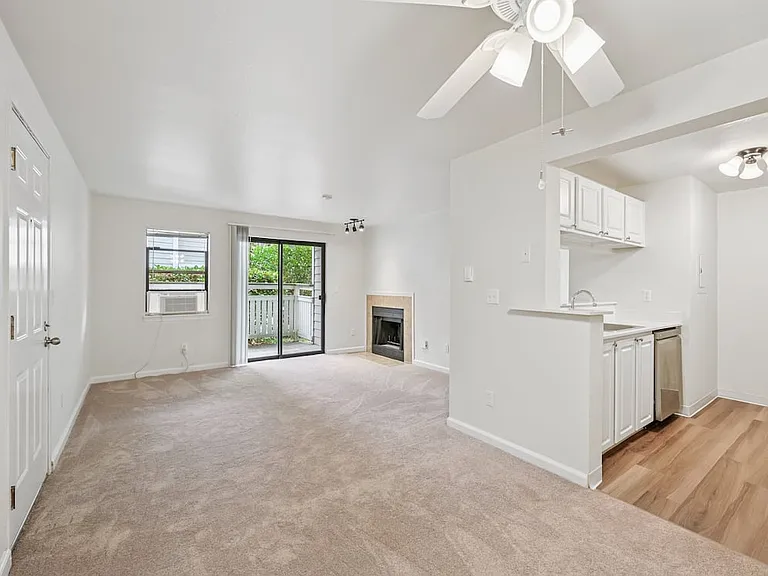 Classic Package III kitchen and living room with carpet (select homes)