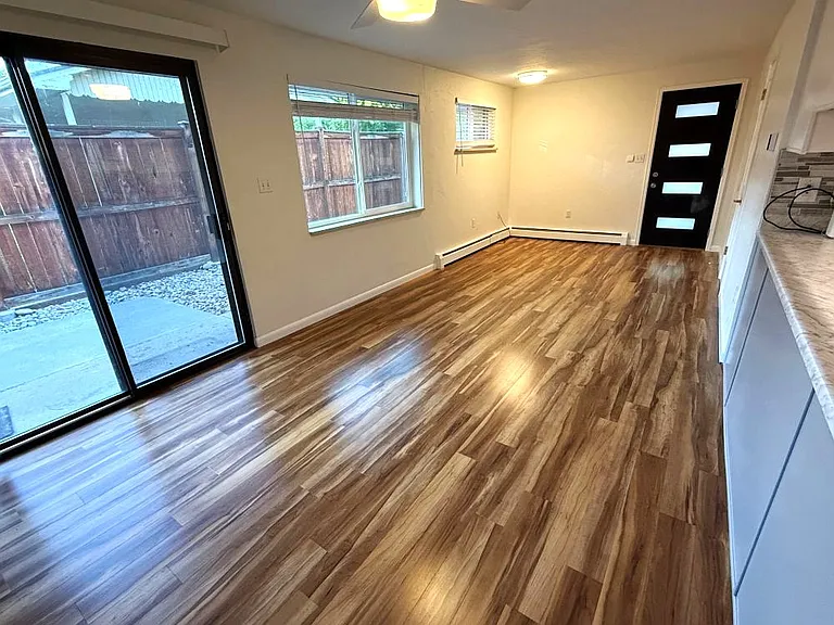 New exterior front door, walks out to the courtyard 2 ways. Dining room and office space.