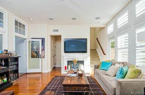 Livingroom view from the kitchen - front door and downstairs bat