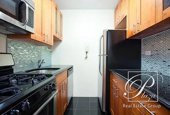 Sold by Plaza Real Estate Group | media 7