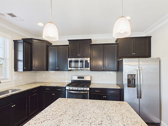 5th image of 8810 Douglas Palace Ct