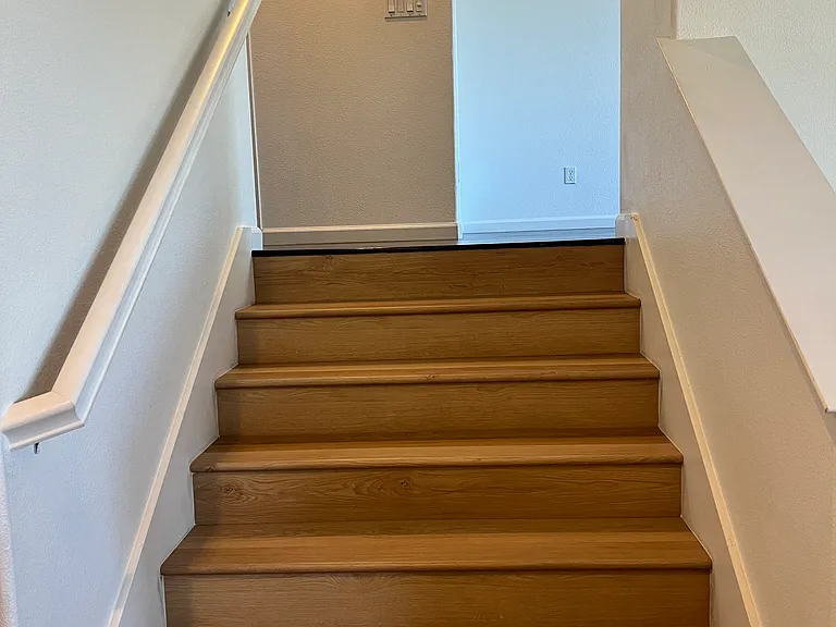Stairs to main living area and kitchen