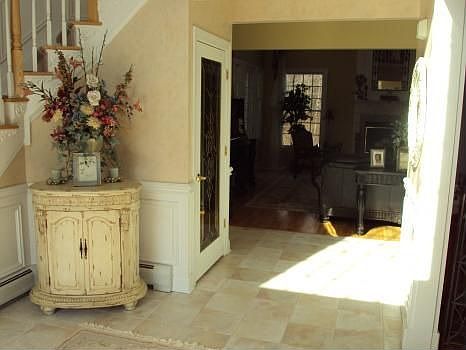 FOYER LEADING INTO FAMILY ROOM