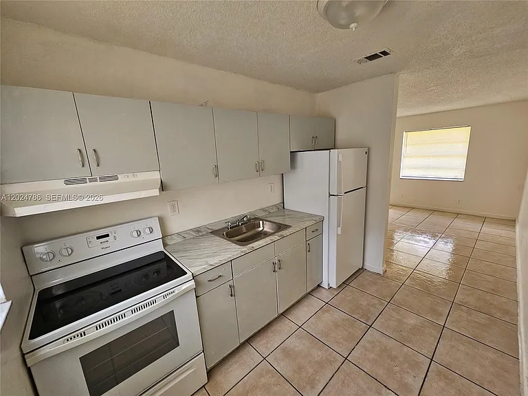2451 NW 8th Pl #1 — Photo 2