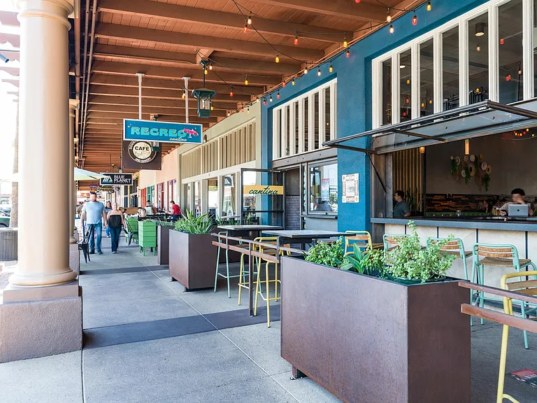 Street-level dining and shaded patios line the walkways at Recreo Cantina_a go-to spot for margaritas, shareable plates, and open-air seating.