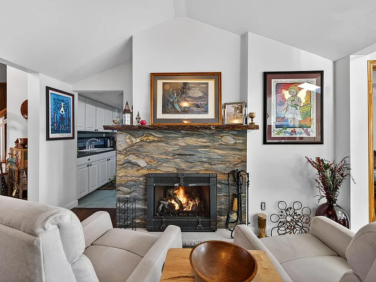 The fireplace always seems to fill these swivel chairs first.