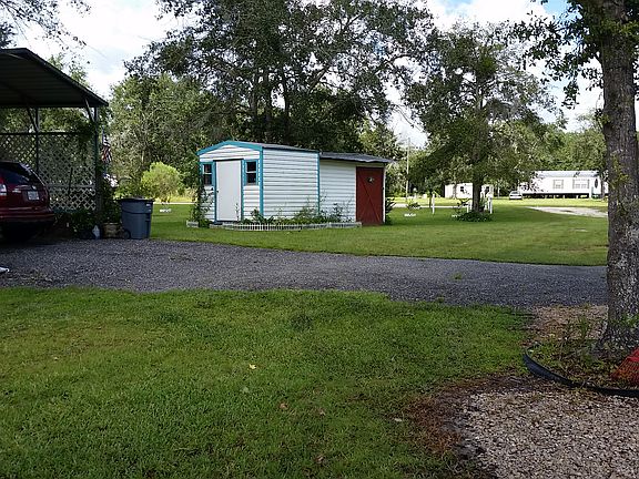 Storage across from carport