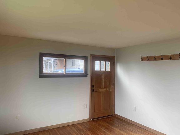 Livingroom facing the front door.