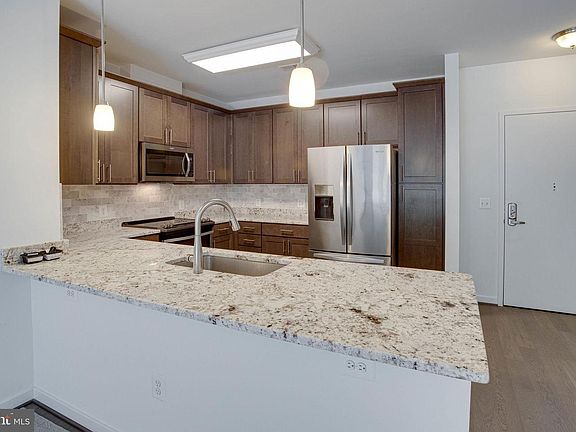 4th image of 9450 Silver King Ct Unit 201
