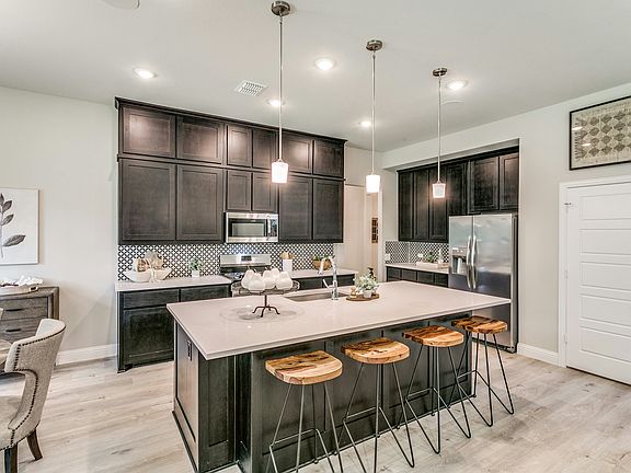 Kitchen of Stone Eagle home in Azle, TX by Kindred Homes