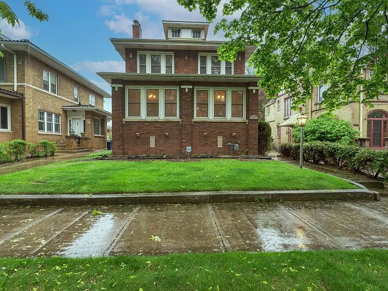 6833 S Cregier Ave — Photo 1