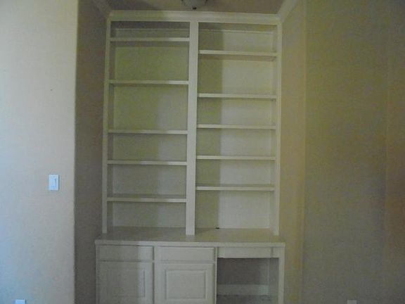 Built in desk and shelves in the study