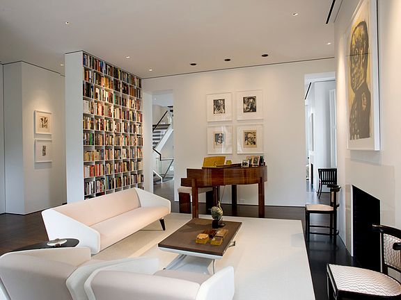 Gracious sitting room w/ walls of built-ins