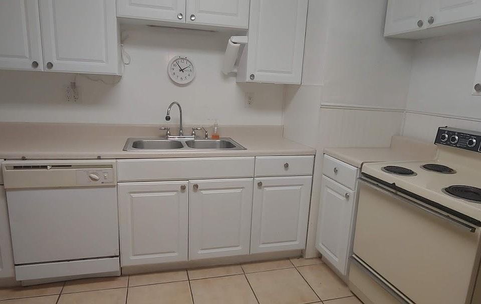 View of the cabinets and counter space in the kitchen.