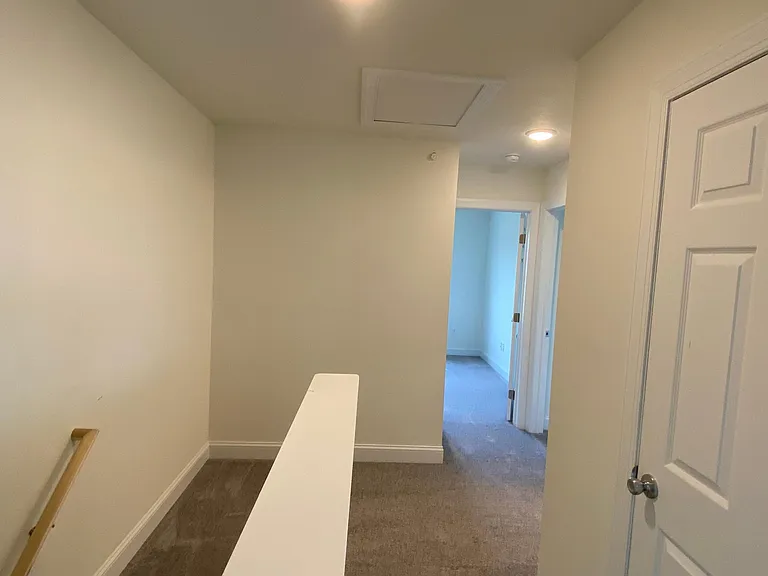 Upstairs Hallway to 3 bedrooms and linen closet