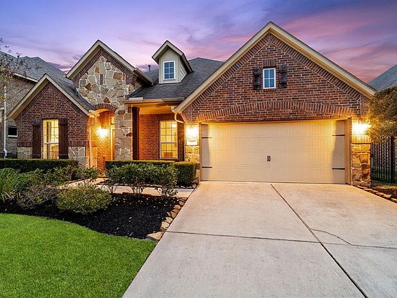 Lovely landscaping and great curb appeal.