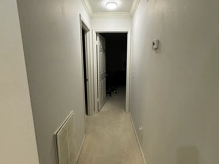 Hallway to additional 3 bedrooms