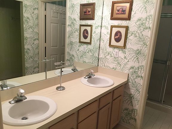 Master suite has double sinks, separate shower