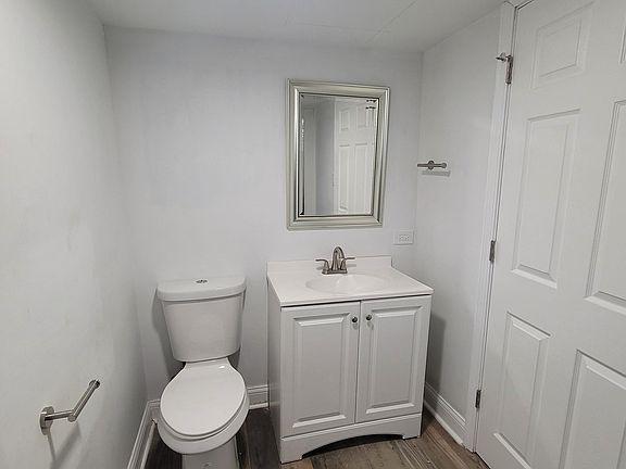 Lower level bathroom full bathroom (sink and toilet)