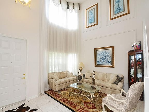 Living room with 18 ft ceilings