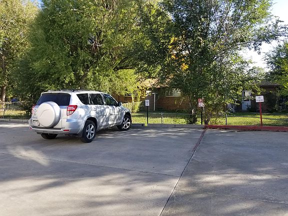 Two reserved off-street parking spaces in back