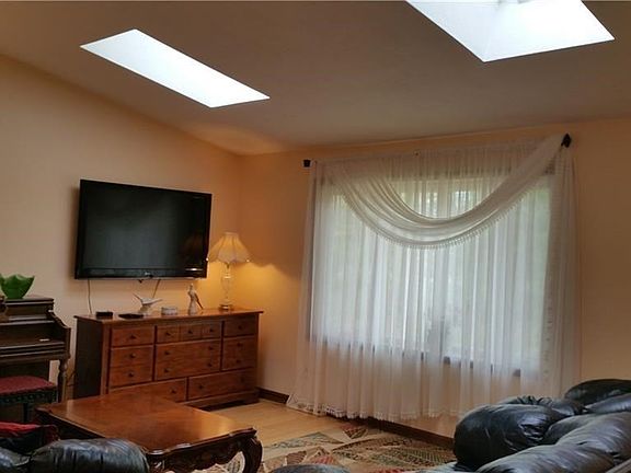 Living room with skylights