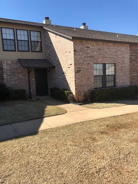 Front of the property with a great view of the common grassed area