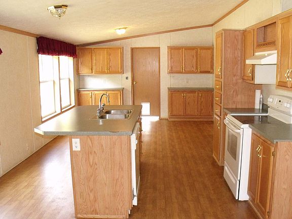 Kitchen: 2nd view of Kit looking toward additional Cabinets & Counter space.