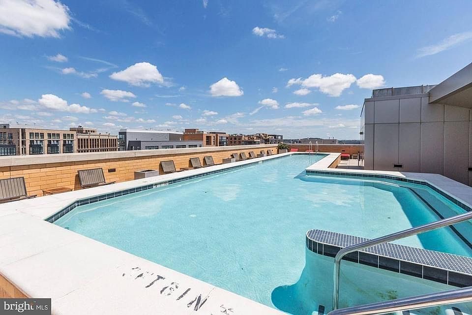 Complex's roof top pool and jacuzzi.