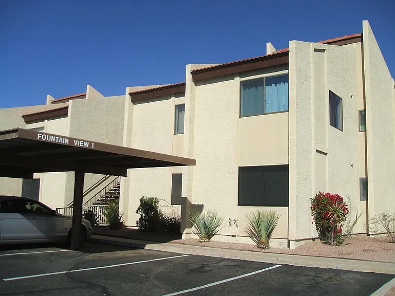 1st floor corner unit, no stairs 
Carport near front door. Grocery store/Cafes across the street