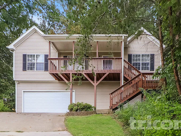 1048 Whispering Woods Dr — Photo 1
