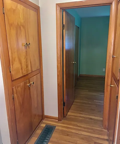 Hallway with built in shelves