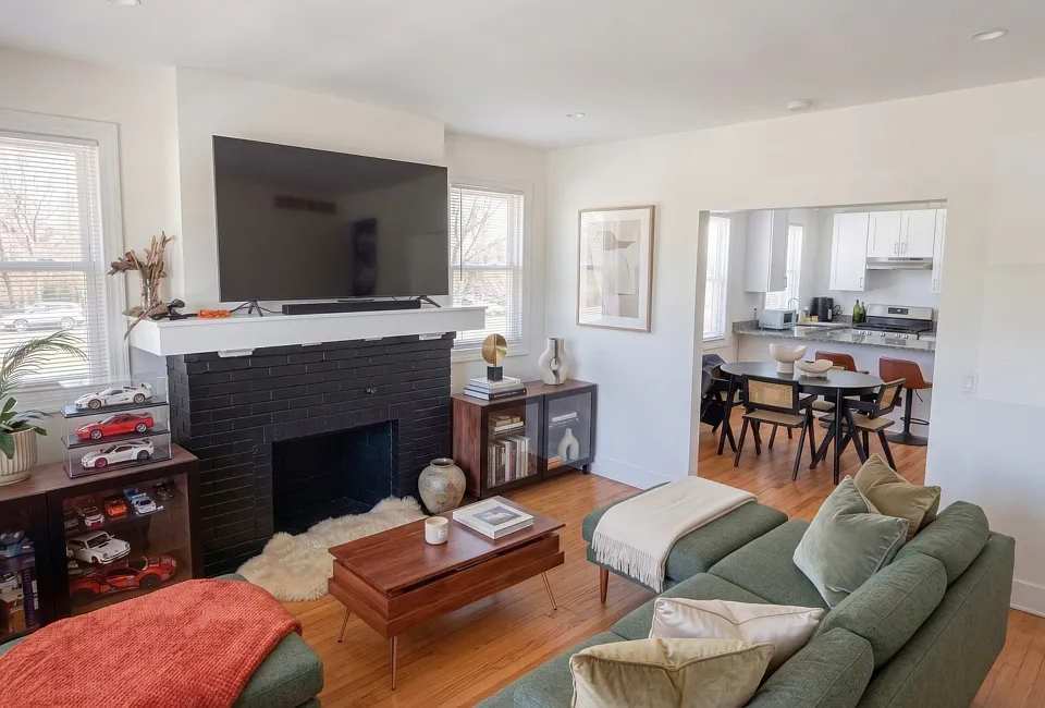 Living Room with dining/kitchen area in background.