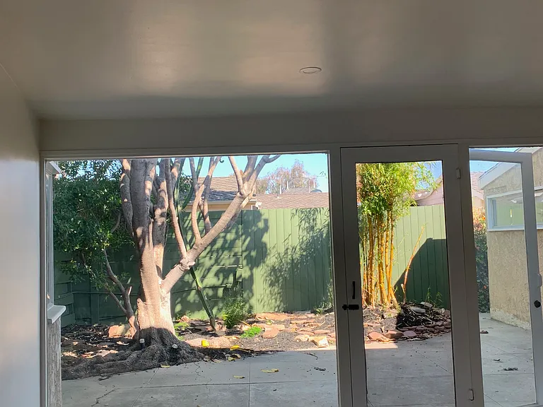 view from living room to private patio