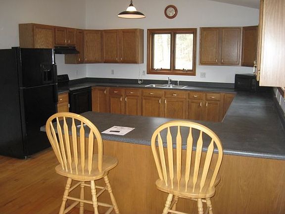 Kitchen with counter seating.